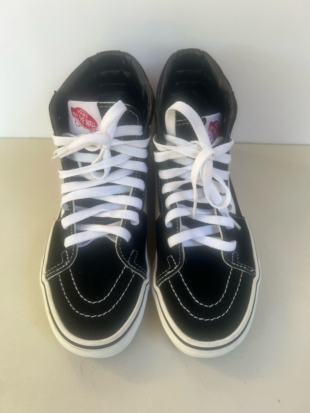 Vans Black and White High-Top Skate Sneakers